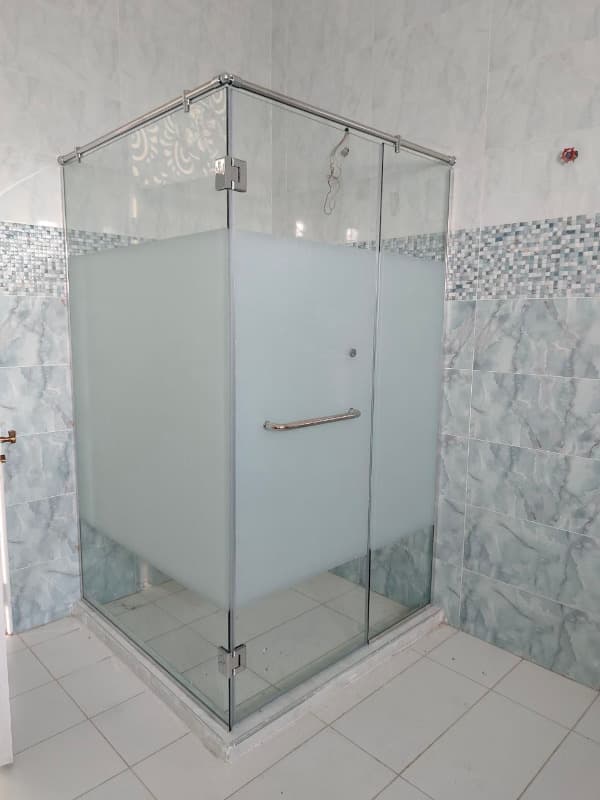 Transform your corner into a luxury shower zone. Sleek, frameless square cubicle with premium tempered glass. Expertly installed by Quickfix Plumbers.